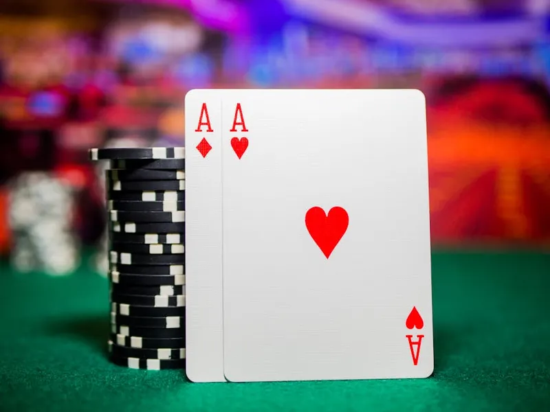 blackjack cards on green felt