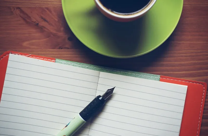 open notebook fountain pen desk study