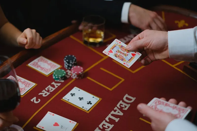 casino player chips hand close blackjack