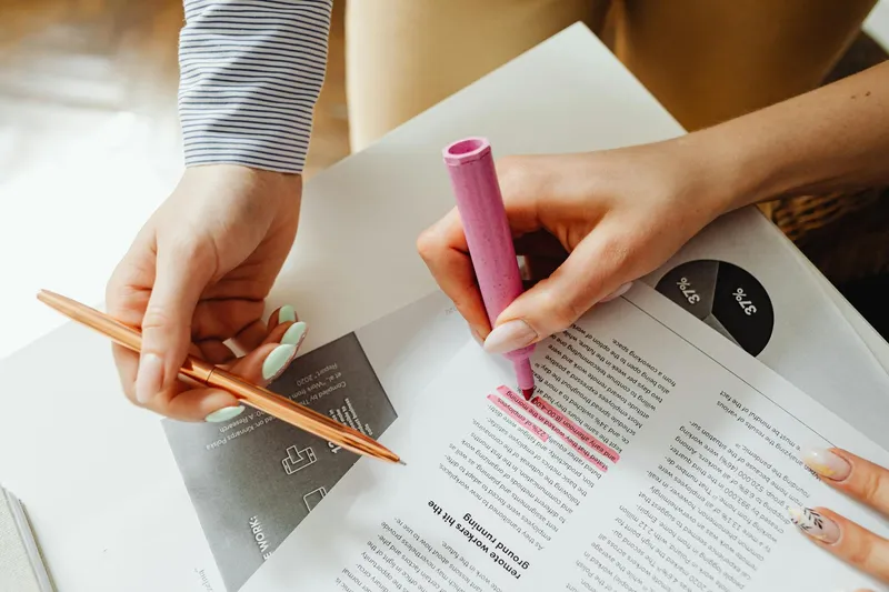 highlighted strategy notes pen paper