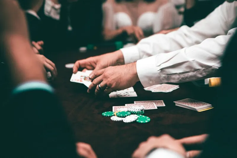 blackjack casino dealer hands cards shoe