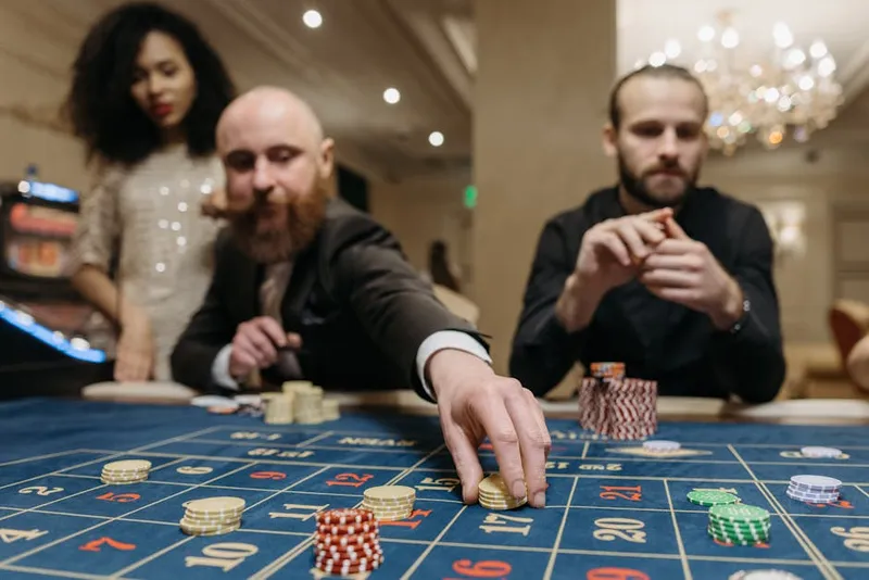 casino floor crowded people gambling night