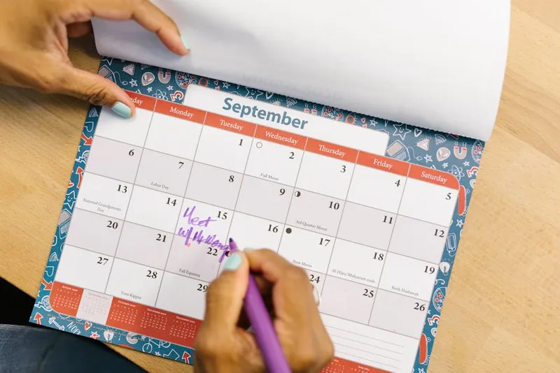 wall calendar pages marked red marker