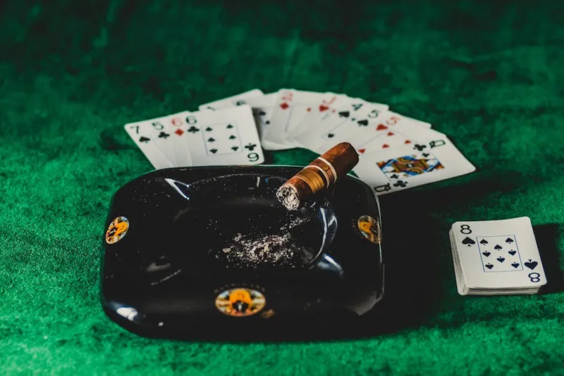 casino blackjack table green felt shoe