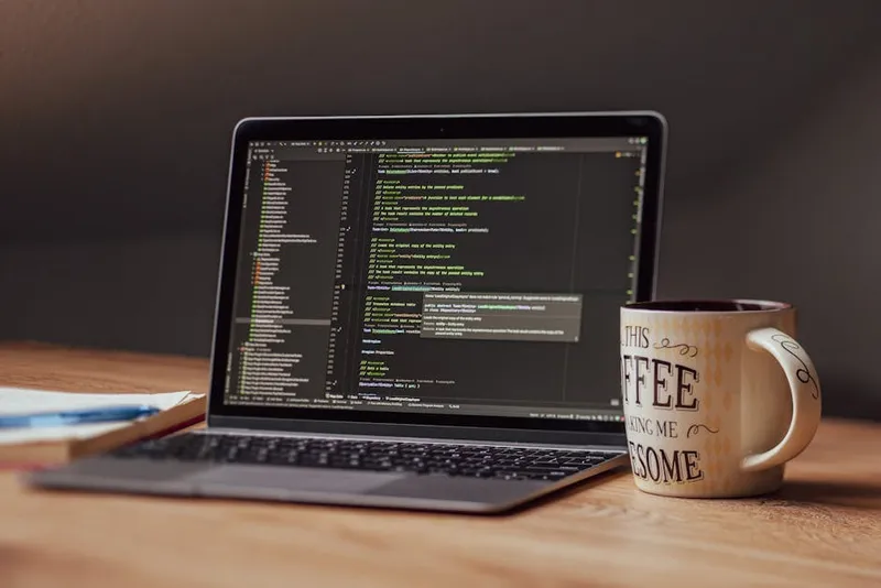 laptop coffee desk freelance workspace