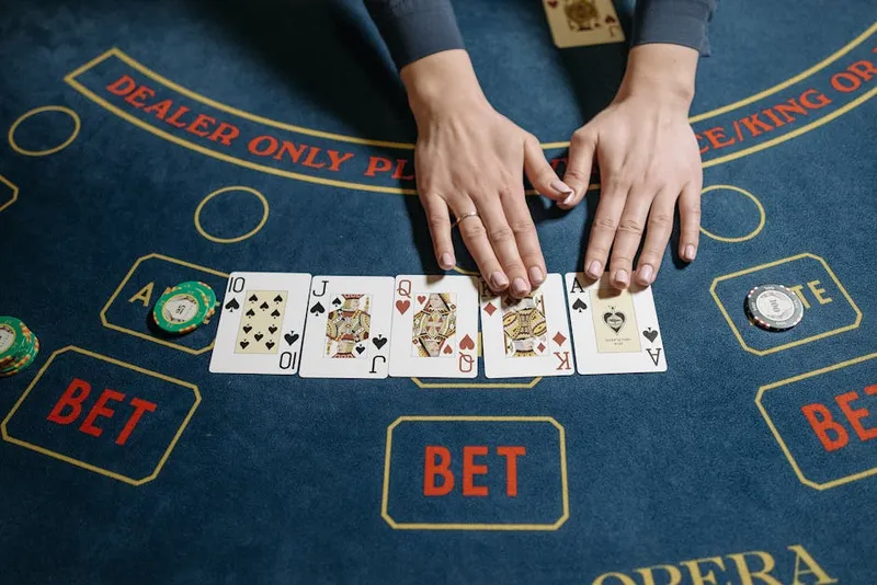 blackjack cards spread dealer bust hand
