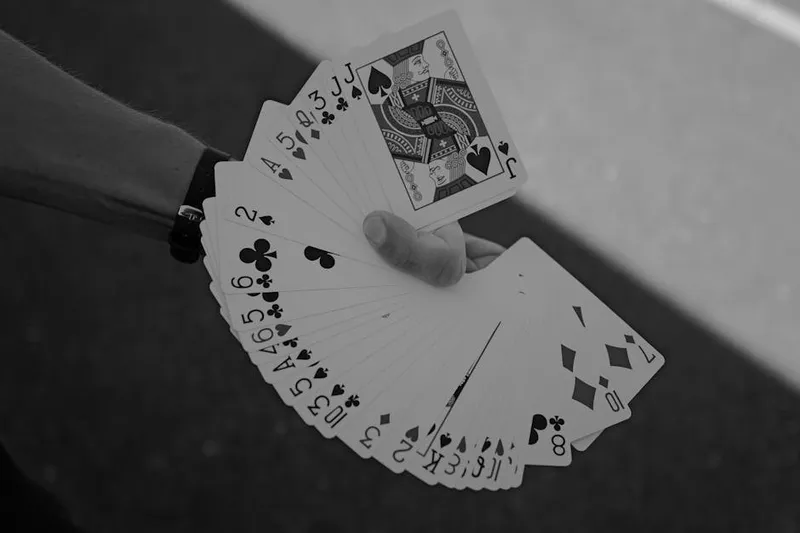 playing card deck single hand fanned